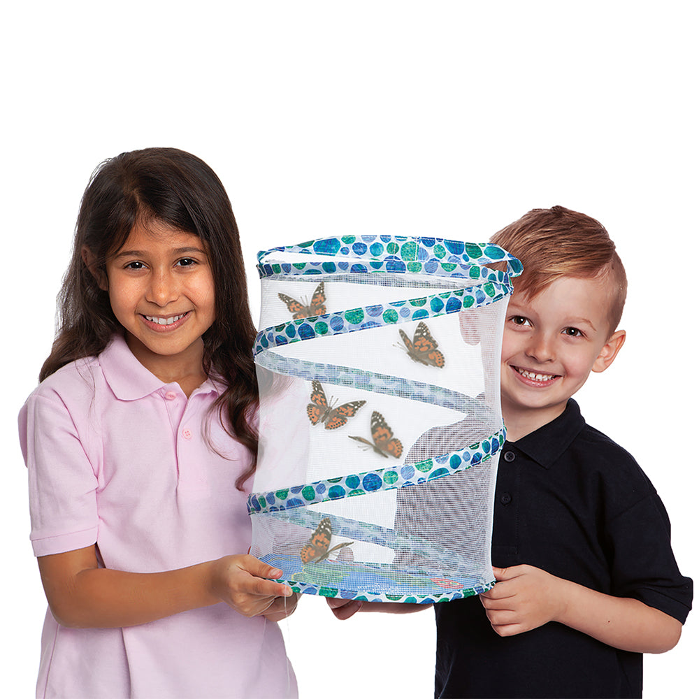 Young girl and boy holding Eric Carle themed 30cm Pop Up Habitat. Butterflies are in the blue and white mesh habitat ready to be released.
